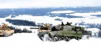 to stridsvogner i vinterlandskap. Foto