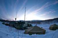 vinterlandskap og mobil militærleir
