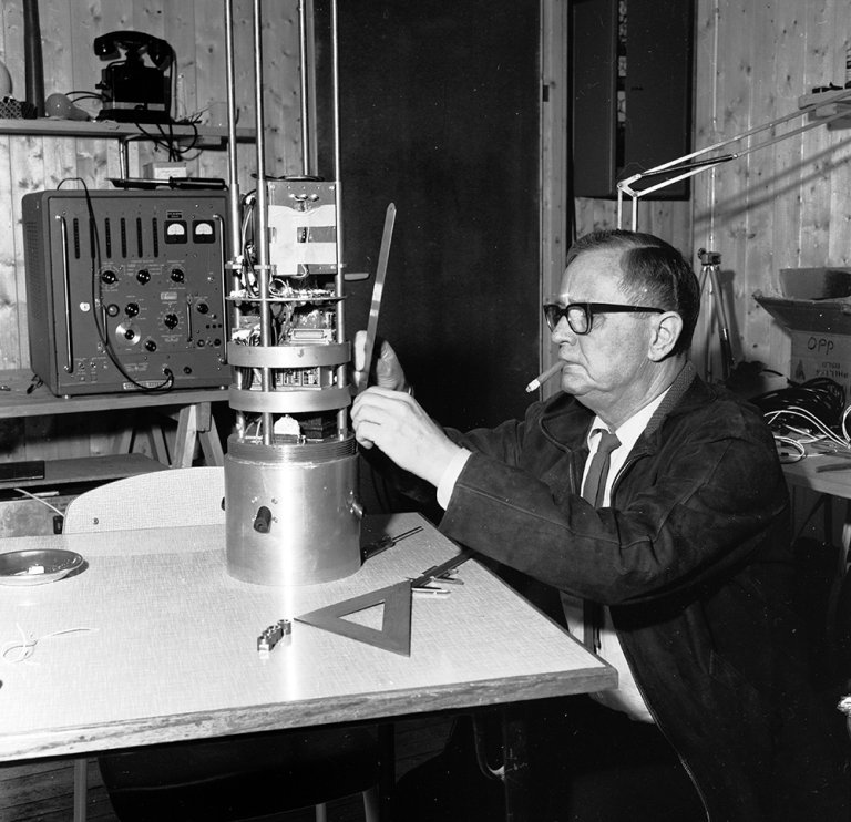 Researcher Odd Dahl sitting down working by a desk