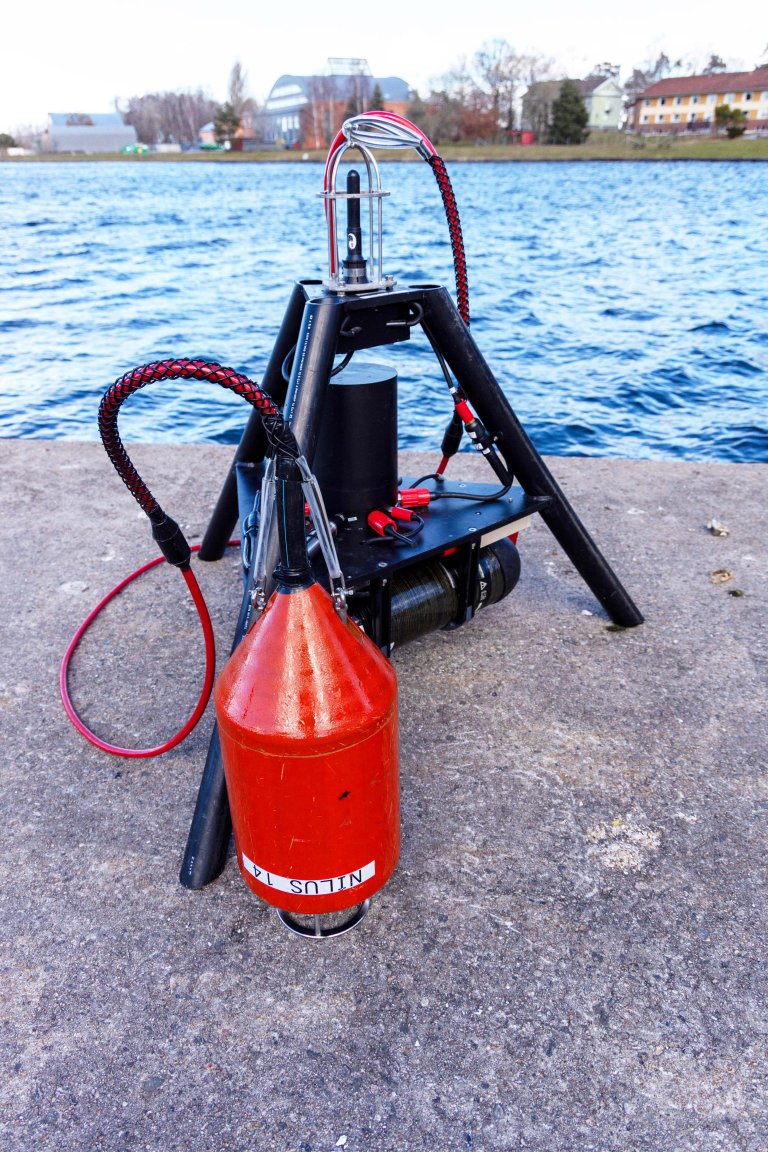 Black and red device on the dock.