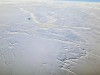 Helikopteret kaster bare en liten skygge over isødet i Beauforthavet, nord for Alaska. Havet er tilfrosset året rundt.