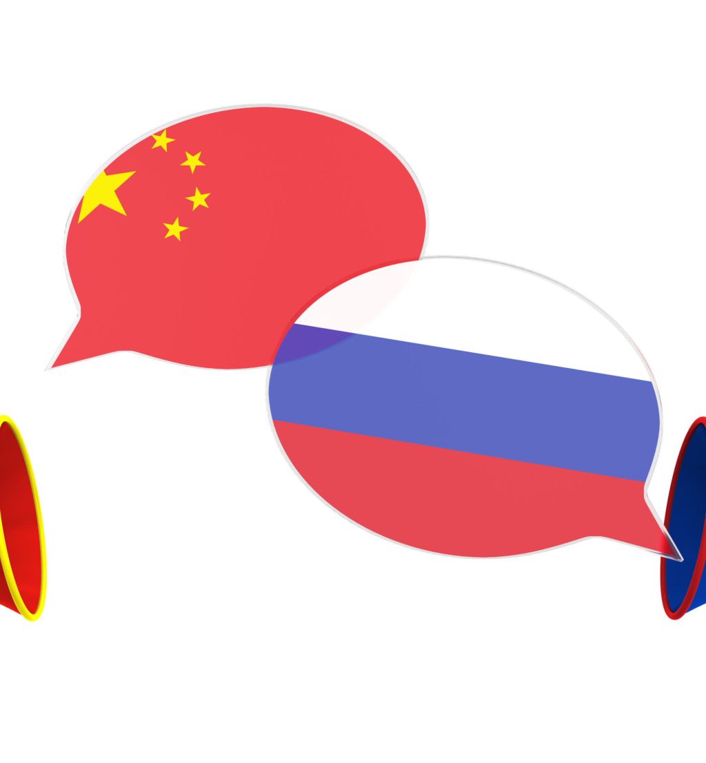 Flags of Russia and China on speech bubbles with loudspeakers. Intercultural dialogue or international talks related 3D rendering