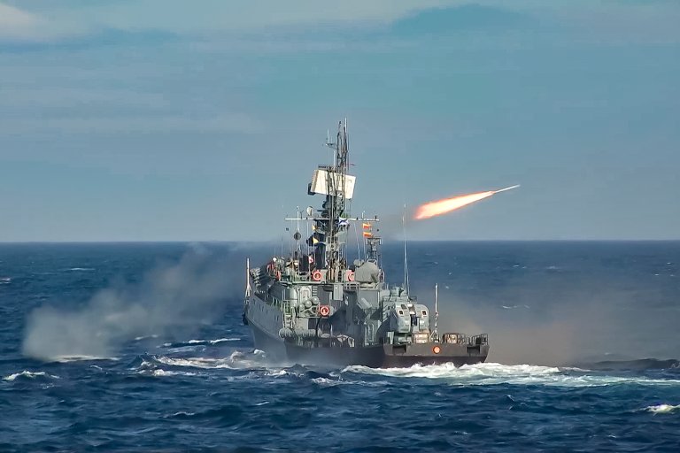 In this photo released by Russian Defense Ministry Press Service on Wednesday, Sept. 11, 2024, a warship of the Russian Northern Fleet forces fires missiles while searching for submarines of a simulated enemy and practice the use of anti-submarine weapons in the Barents Sea during a large scale naval exercise as the Ocean-2024 drills. (Russian Defense Ministry Press Service via AP)